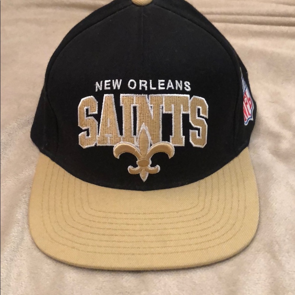 Mitchell & Ness Saints Snap Back hat.